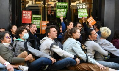 Environmental activists impeded entry to TotalEnergies' annual general meeting in Paris, in protest over the firm's climate policies