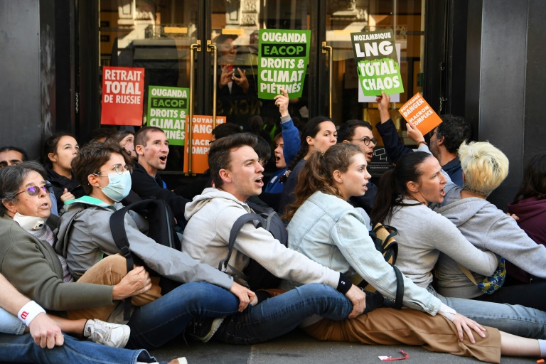 Environmental activists impeded entry to TotalEnergies' annual general meeting in Paris, in protest over the firm's climate policies