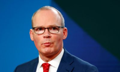 Irish Foreign Minister Simon Coveney said the UK risks breaking international law if it takes unilateral action over post-Brexit trading rules for Northern Ireland