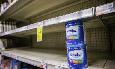 Shelves normally meant for baby formula sit nearly empty at a store in downtown Washington, DC, on May 22, 2022