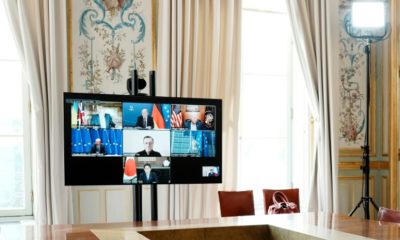 G7 leaders, pictured on screen during a video-conference at the Elysee Palace in Paris, committed to phasing out dependency on Russian oil in response to Moscow's invasion of Ukraine