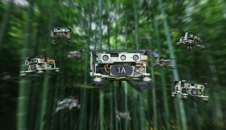 This Handout photo provided by Yuman Gao and Rui Jin on May 4, 2022 shows a new flight path planning system enables drone swarms to fly through crowded forests without collisions