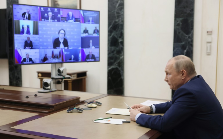 Russian President Vladimir Putin, pictured chairing a meeting on the oil industry, has been targeted by sanctions
