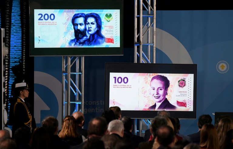 The new series of Argentine peso notes are displayed on screens during the presentation at the Bicentennial Museum of Casa Rosada House of Government in Buenos Aires, on May 23, 2022