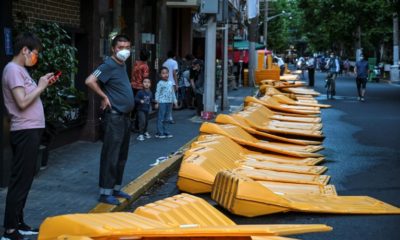 Barriers erected to isolate buildings and city blocks in Shanghai have been taken down in many areas as authorities ease Covid restrictions