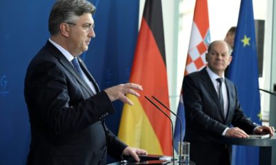 Croatia's 'aim' was to enter the Schengen open-borders zone on the same date it adopts the euro, Prime Minister Andrej Plenkovic told reporters in Berlin