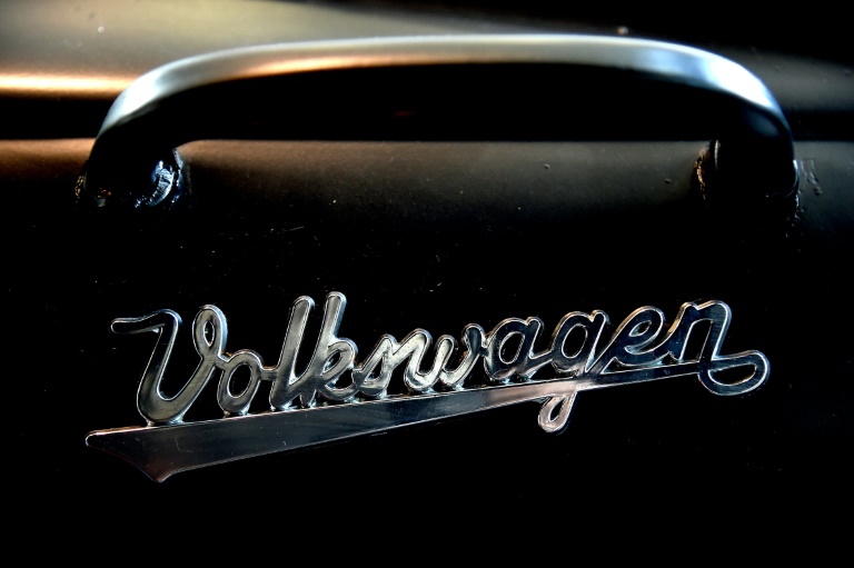 A picture shows the Volkswagen logo in a vintage Volkswagen Kombi bus: the German carmaker faces an audience with Brazilian prosecutors over allegations of human-rights violations at a farm it ran during Brazil's military dictatorship