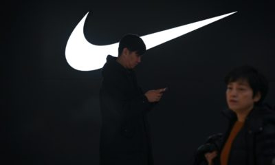 Nike reported lower sales in North America and China and projected flat to slightly higher sales amid inflation, the strong dollar and other headwinds