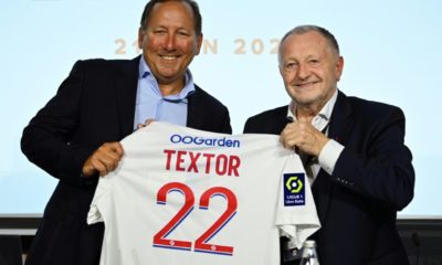 Lyon president Jean-Michel Aulas (R) and US businessman John Textor (L)