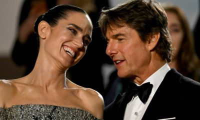 Actors Jennifer Connelly and Tom Cruise share a laugh after the screening of 'Top Gun: Maverick' at the Cannes Film Festival in France on May 18, 2022