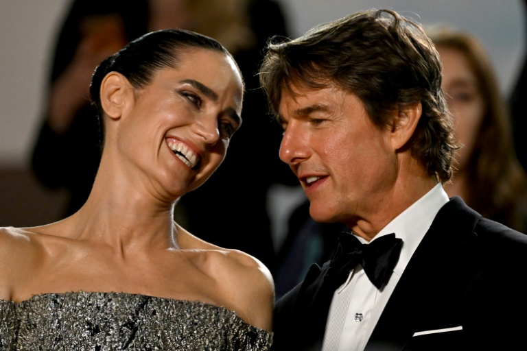 Actors Jennifer Connelly and Tom Cruise share a laugh after the screening of 'Top Gun: Maverick' at the Cannes Film Festival in France on May 18, 2022