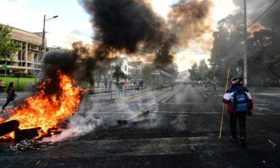 Roads blocked during the ongoing protests in Ecuador have hindered oil production and could force a halt to output, the government says
