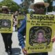 Protesters march in front of Snapchat headquarters in Santa Monica, California on June 13, 2022 demanding social media companies to block the sale of drugs on their platforms