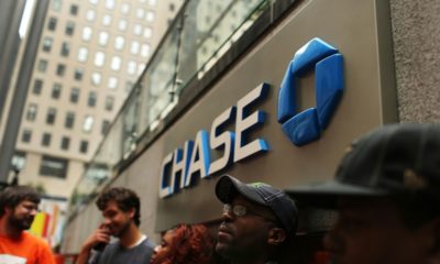 JPMorgan Chase reported a drop in profits after setting aside reserves in case of defaults