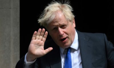 Boris Johnson says his caretaker government will freeze tax policy, leaving any changes to his successor