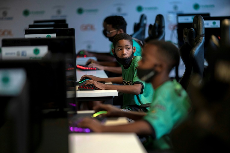 Children play a video game called League of Legends in Rio de Janeiro, Brazil; a large new US study published in JAMA Network Open indicates there may be cognitive benefits associated with video gaming