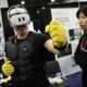 A man tries out the Haptic Suit by bHaptics at the CES tech show in Las Vegas