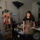 Illustrator and content artist Karla Ortiz poses in her studio in San Francisco, California