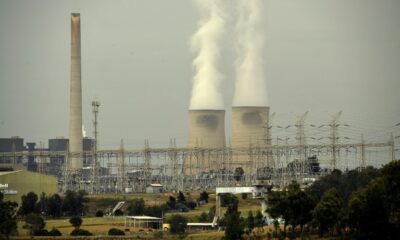 Steam rises from the cooling towers of the Liddell power station in the town of Singleton, New South Wales