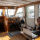 Amy Whetzel works in her boat, Miranda, anchored in Mayo, Maryland, about an hour's drive form the US capital