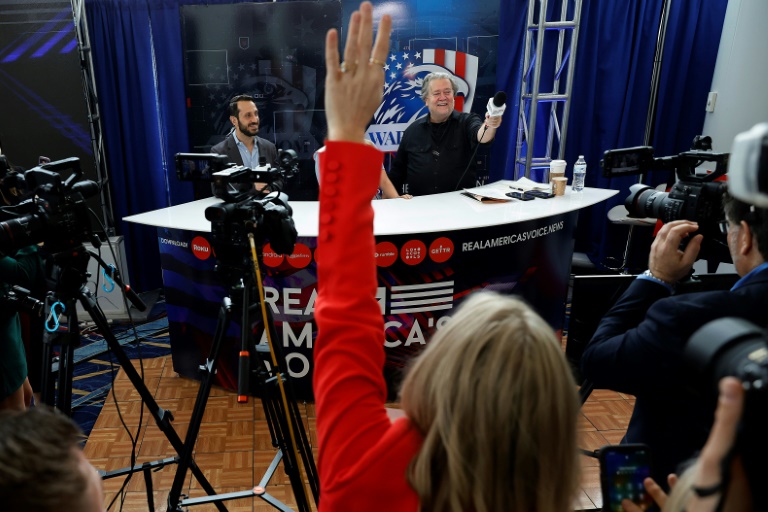 Steve Bannon (R), former advisor to former US president Donald Trump, hosts his War Room podcast live during the Conservative Political Action Conference on March 2, 2023 in National Harbor, Maryland