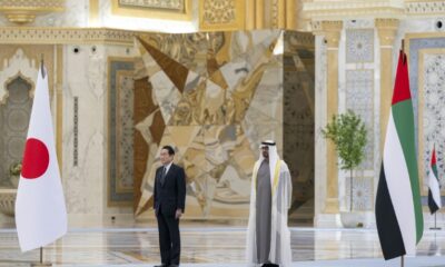 UAE President Sheikh Mohammed bin Zayed Al Nahyan (R) welcoming Japan's Prime Minister Fumio Kishida