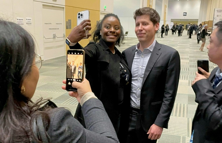 Sam Altman, former CEO of OpenAI, takes photos with attendees during the Asia-Pacific Economic Cooperation (APEC) Leaders' Week in San Francisco