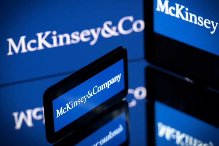 Screens displaying the logo of US-based McKinsey & Company, the world's top management consulting firm