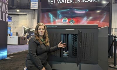 Genesis Systems co-founder Shannon Stuckenberg discusses the inner workings of a WaterCube device that extracts water from the air during the Consumer Electronics Show in Las Vegas