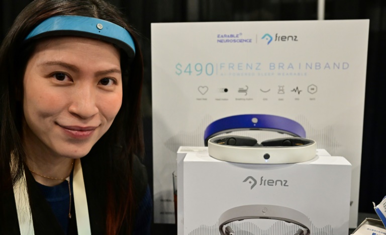Kim Doan, head of investments at Earable, presents the "Brainband" at the Las Vegas tech show, January 7, 2024