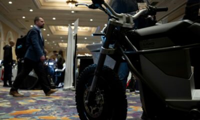 A man walks past an e-bike at the The Mirage resort during the Consumer Electronics Show (CES) in Las Vegas